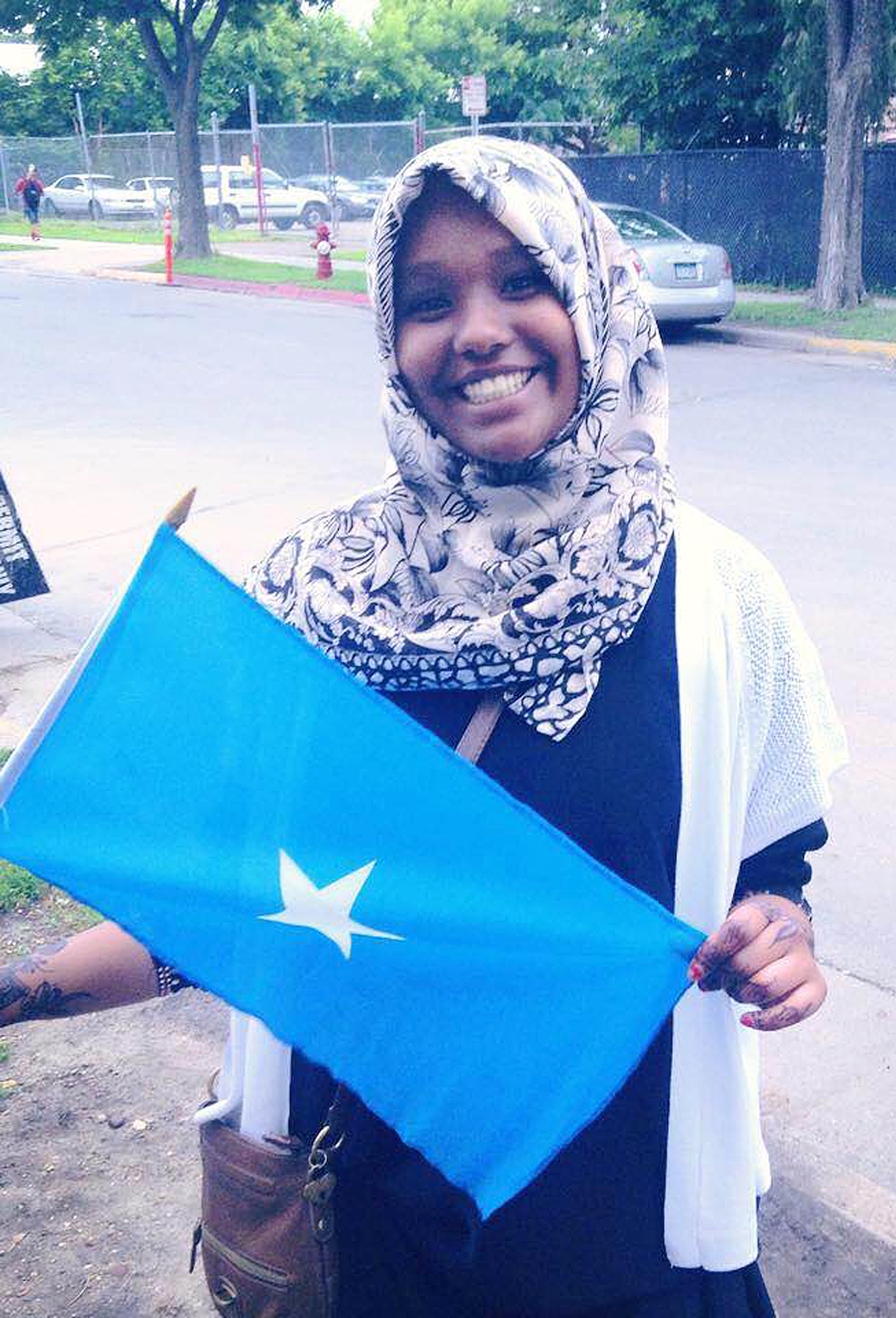 young Muslim woman with Somali flag
